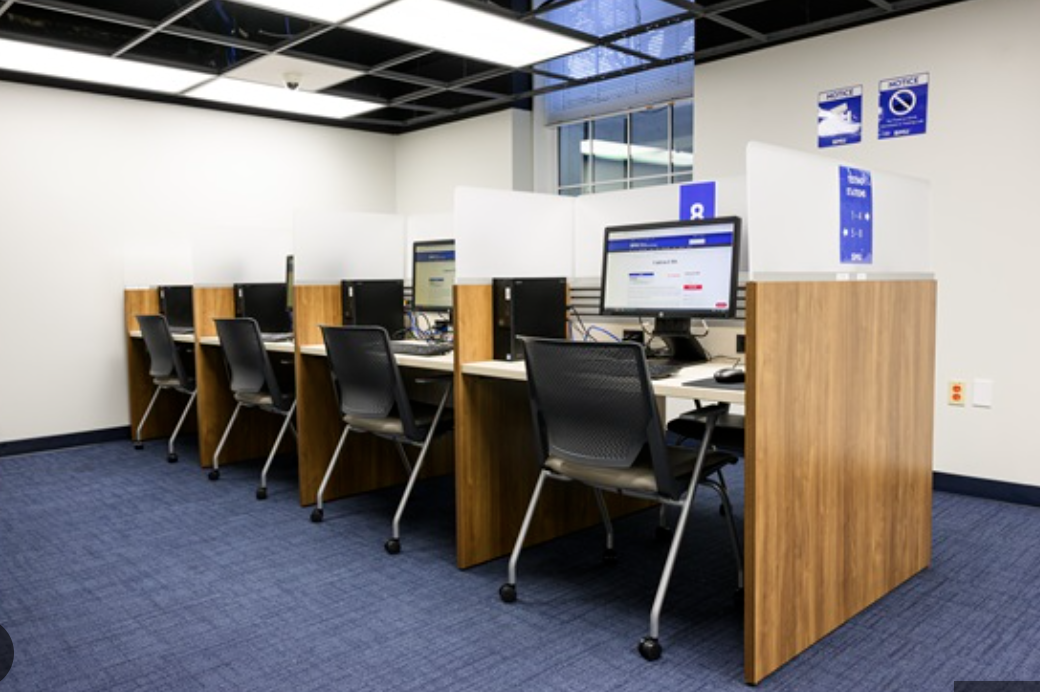 Professional testing center with private computer stations and privacy dividers